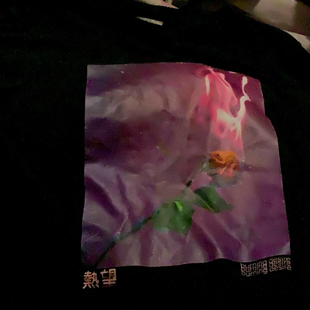 A black shirt with Japanese sayings